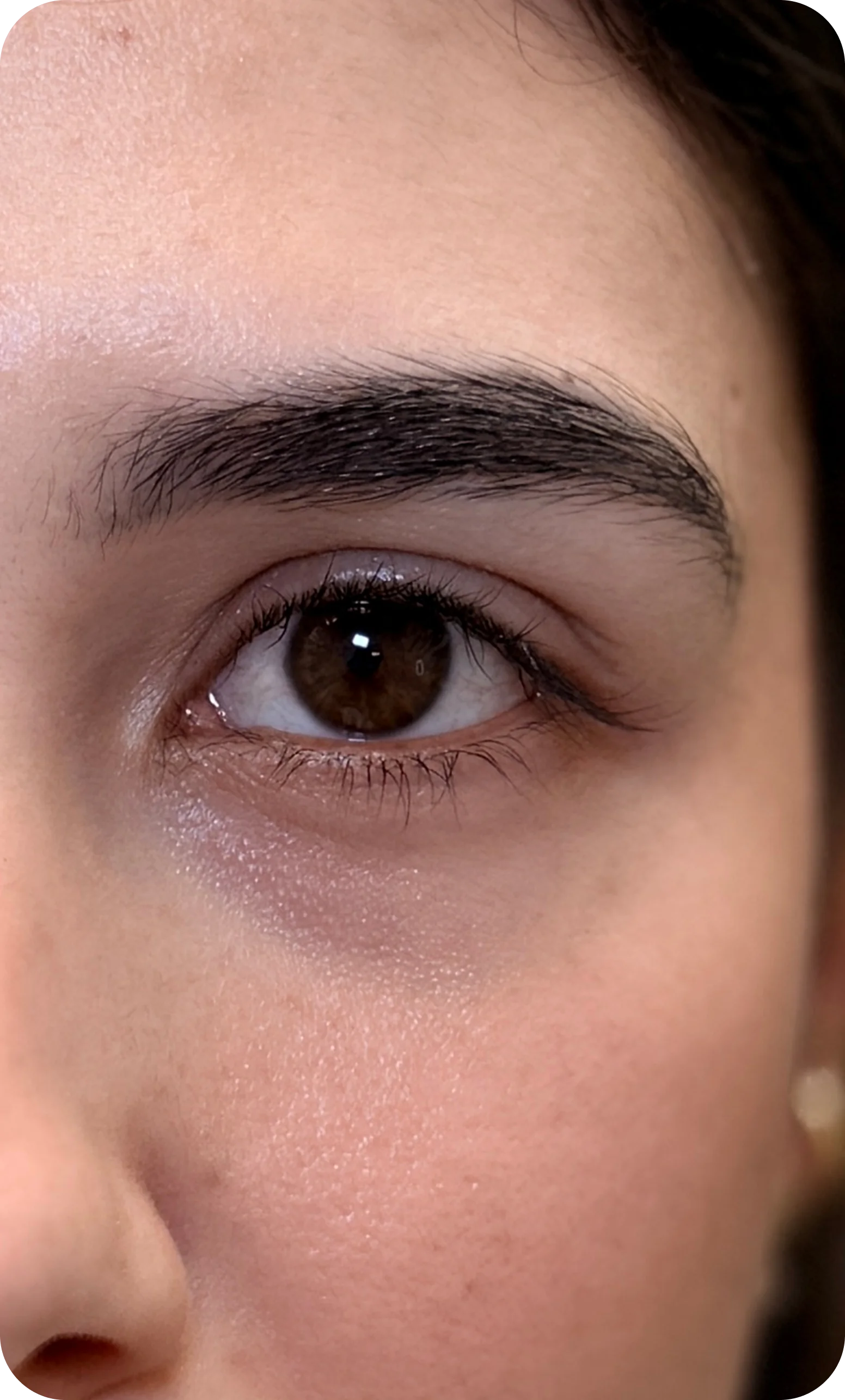A client’s face with defined brows.